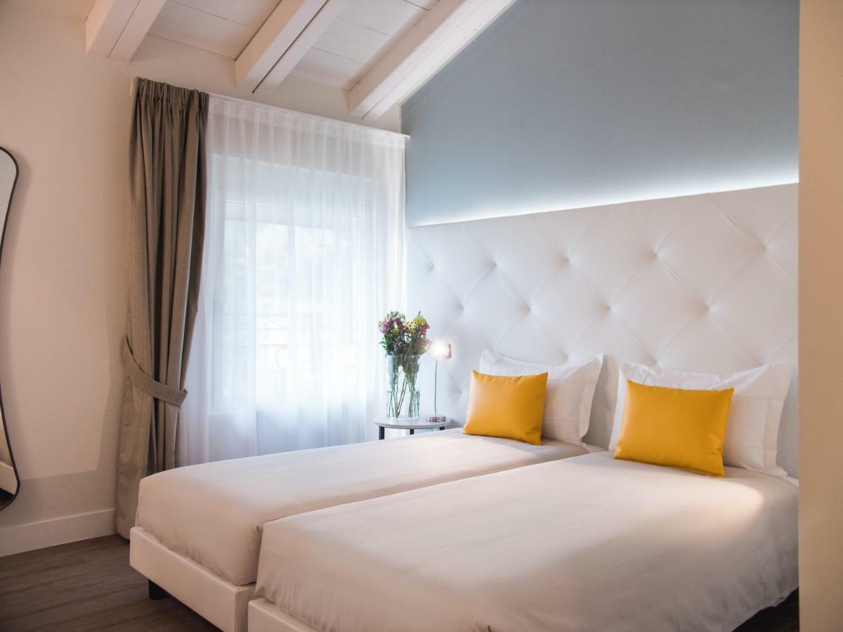 Araba Fenice Hotel Iseo Bagian luar foto